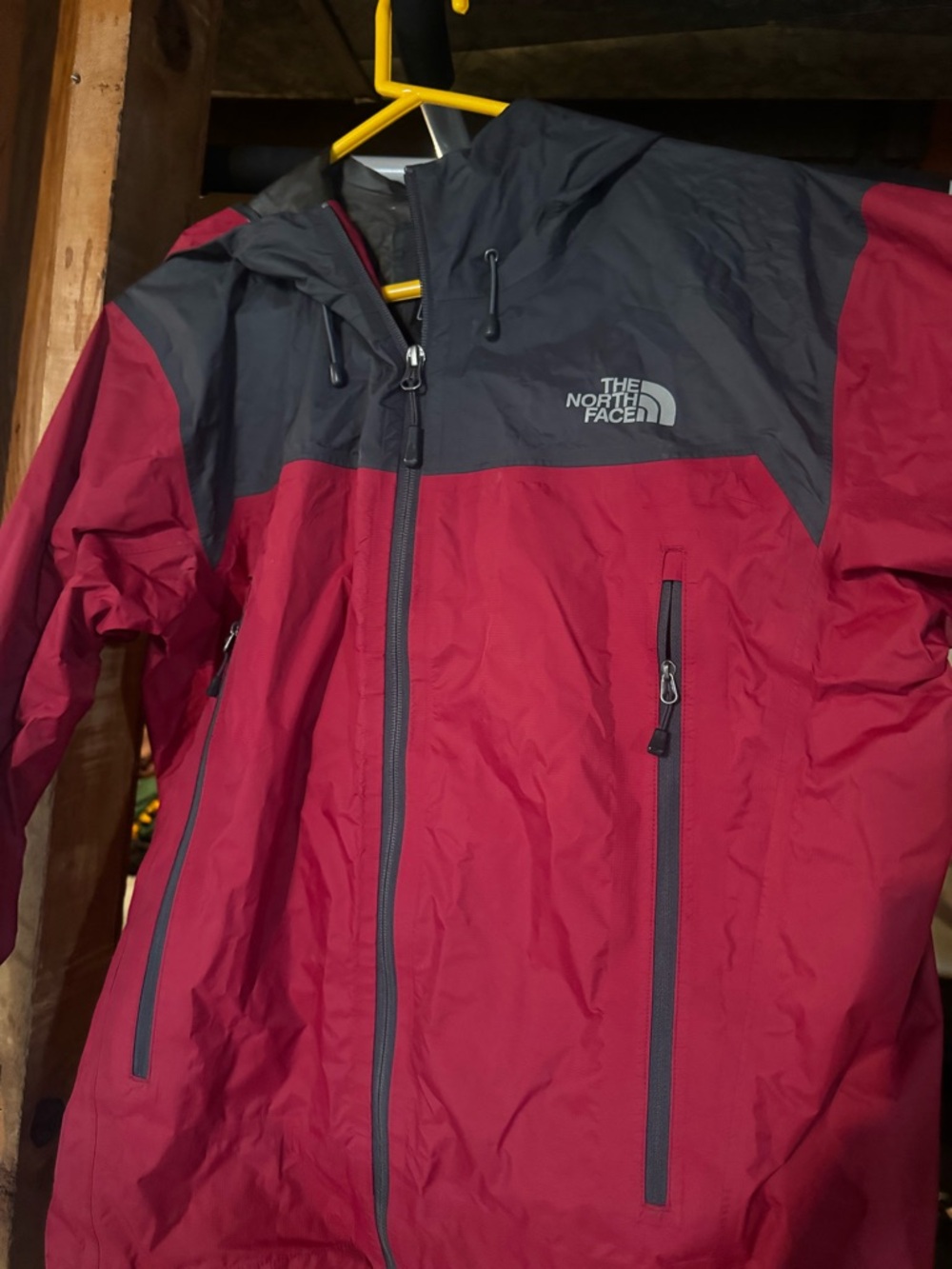The North Face Black and Red Hooded Windbreaker Jacket